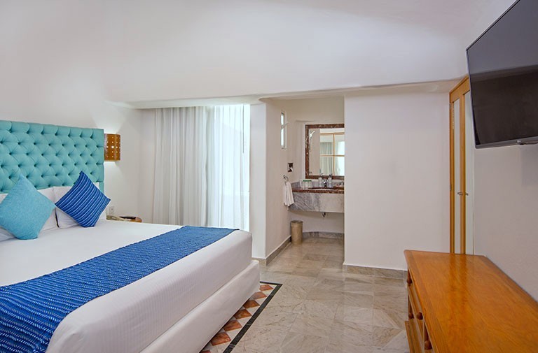 Sunset World – Resorts – Sunset Marina Resort & Yacht Club | Bedroom Pantalla